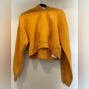 Guess Logo Cropped Hoodie in Mustard